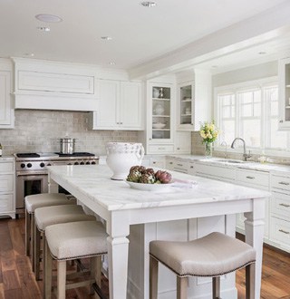white kitchen floating fan wood counters